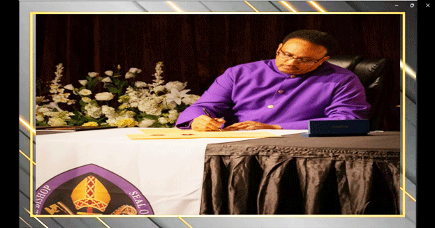 Bishop Signing Document